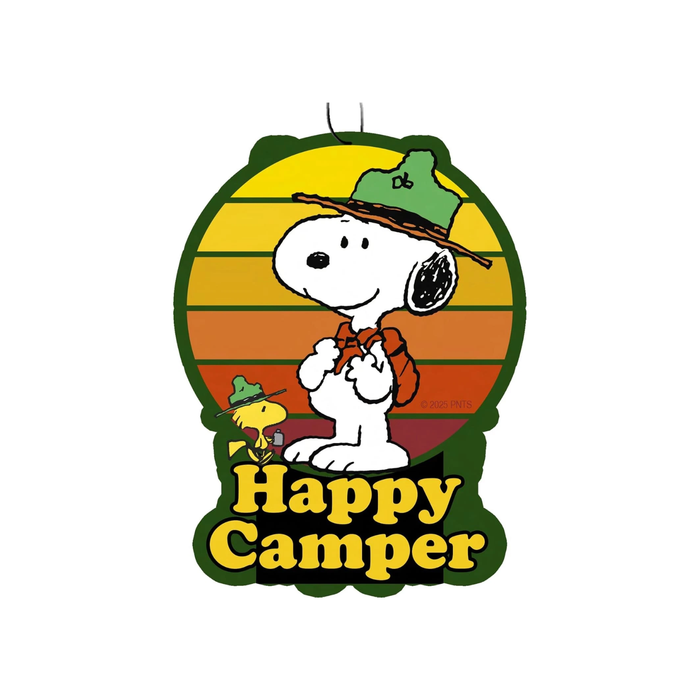 A Snoopy 'Happy Camper' air freshener or wall decal featuring Snoopy in a green camp hat and orange backpack against a striped sunset background, with Woodstock beside him and the words 'Happy Camper' at the bottom.