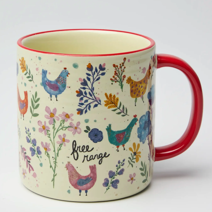 mug with red handle painted flowers and chickens that says "free Range" in a black script font