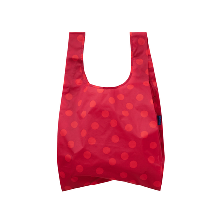 red reusable baggu bag with red polka dots on a white background
