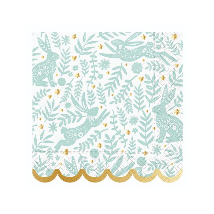 Patterned paper napkins with rabbits, leaves, and flowers on a white background