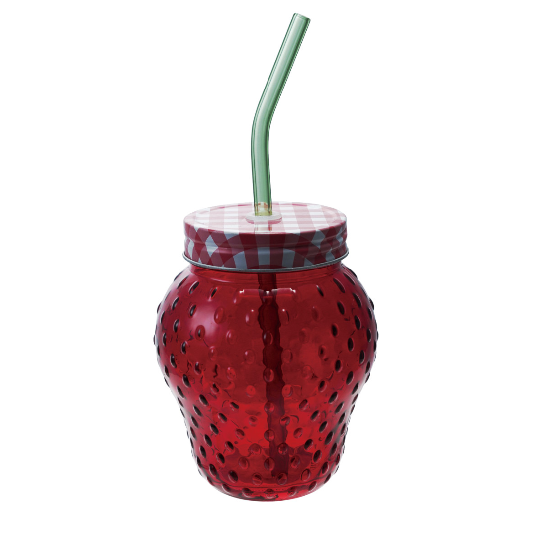 Red glass cup with a checkered lid and straw on a white background