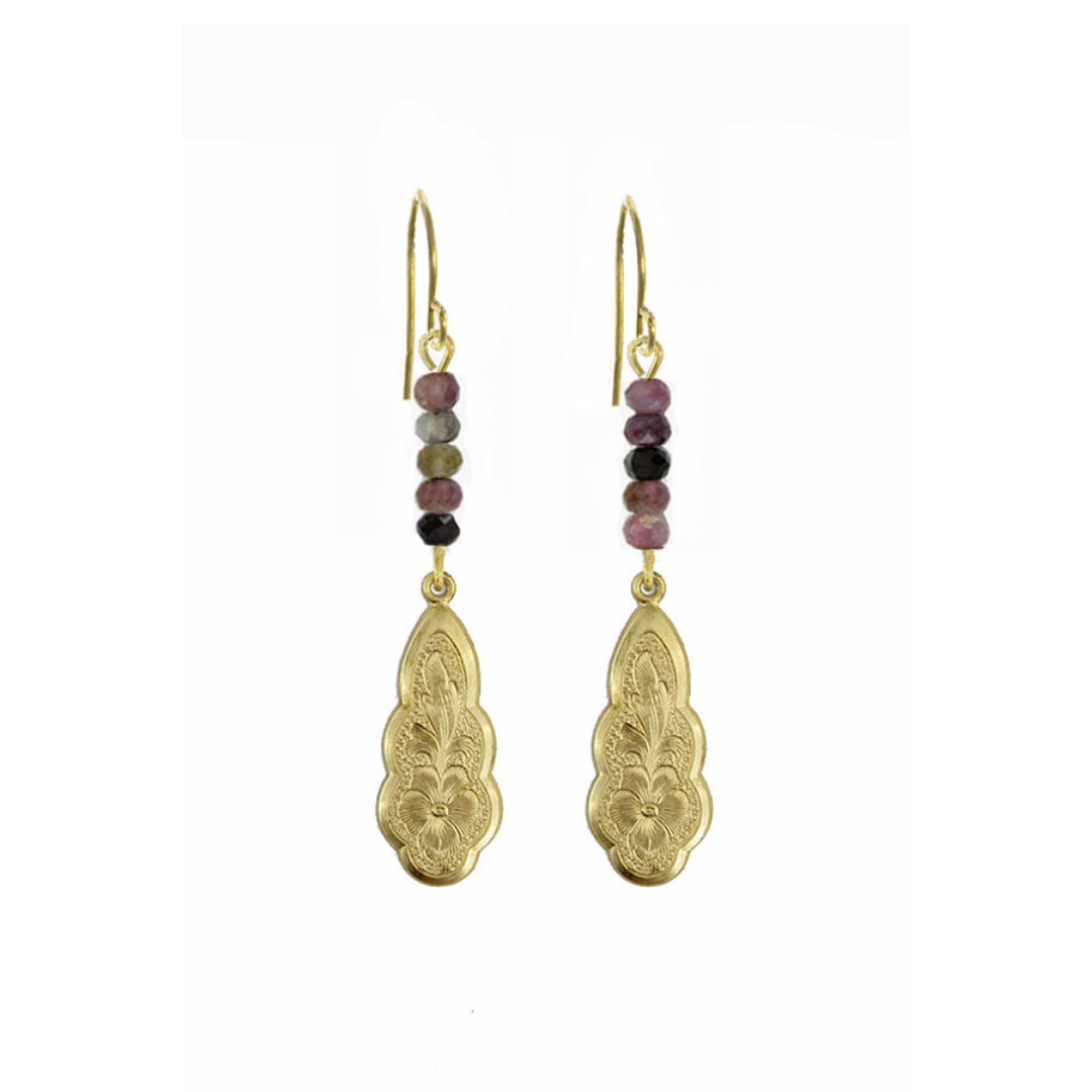 Gold earrings with beaded accents on a white background