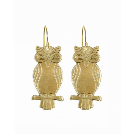 Gold owl-shaped earrings on a white background
