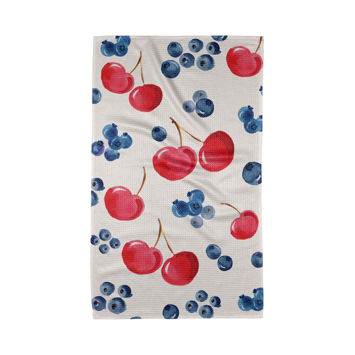 Towel with red cherries and blueberries pattern on a white background