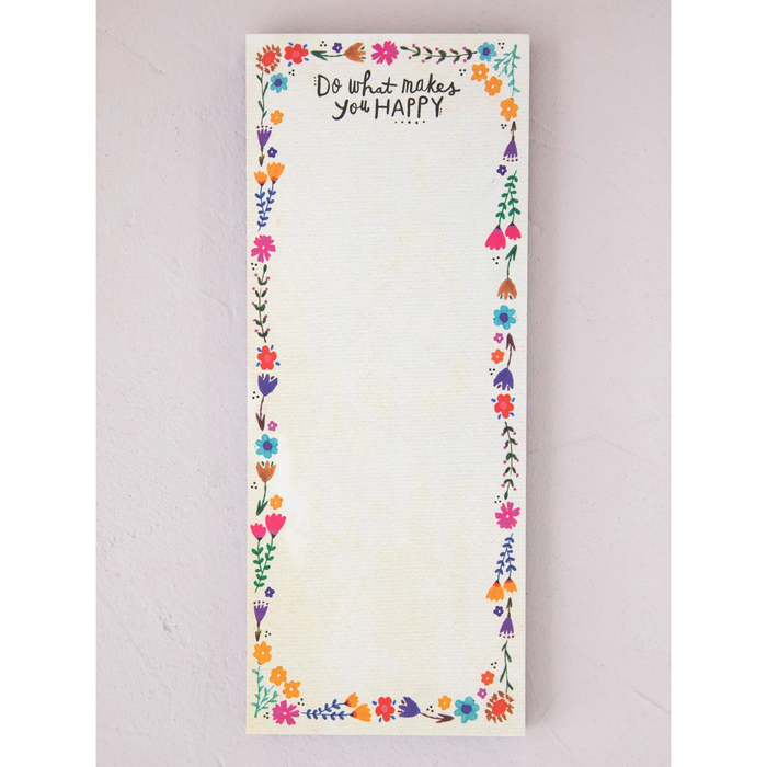 Notepad with floral border and motivational quote on a light background