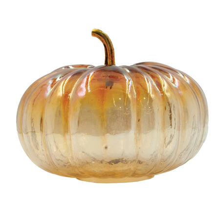 Glass pumpkin on white background