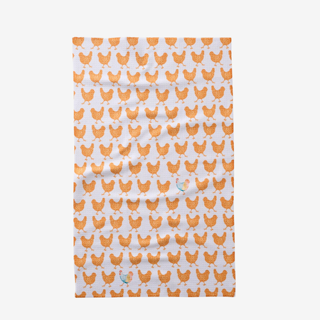 Patterned fabric with orange chicken design on a white background