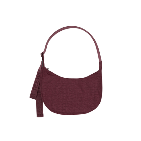 Maroon shoulder bag on a white background