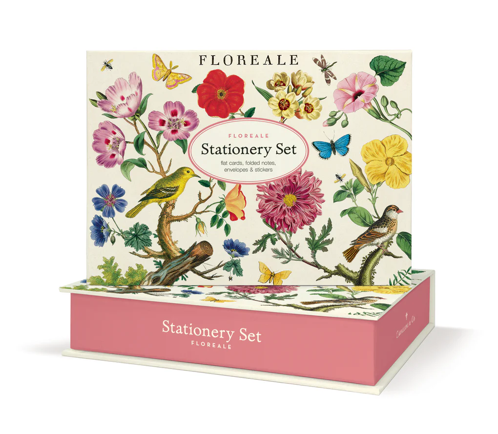 Floreale stationery set packaging with floral and bird design on a white background