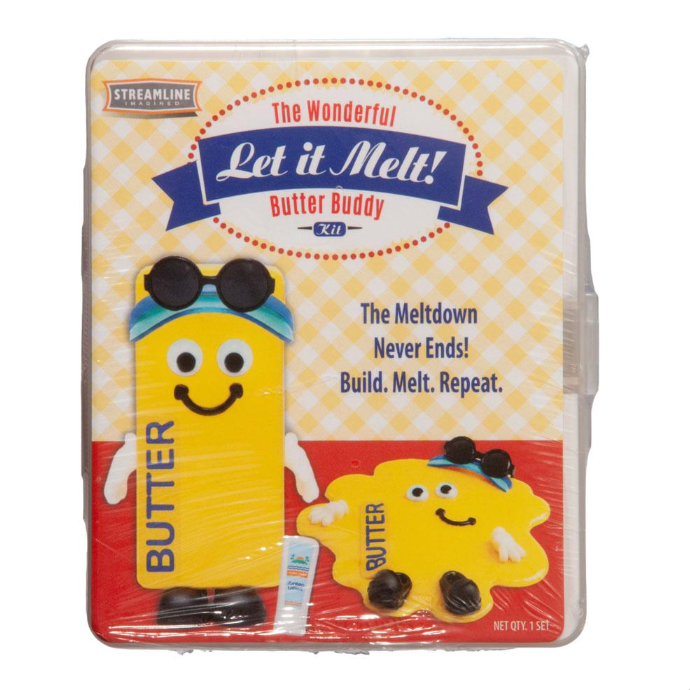 Streamline Let it Melt! Butter Buddy kit in its original retail packaging, featuring a yellow melting butter character with sunglasses and a blue headband, shown inside a clear plastic-wrapped box with a retro-themed yellow and red label.