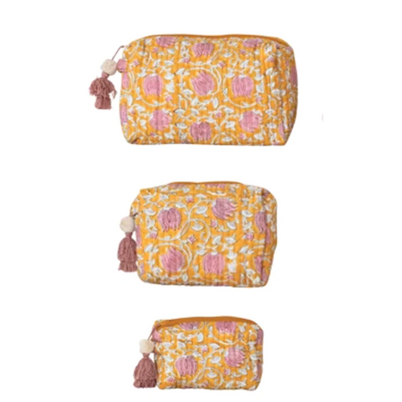 Set of three floral-patterned pouches with tassels on a white background