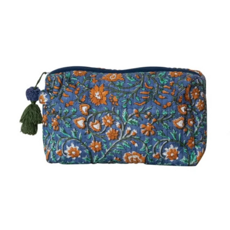 Floral patterned pouch with tassel on a white background