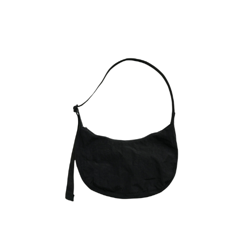 A black nylon crescent-shaped shoulder bag with an adjustable strap and a front zipper pocket.