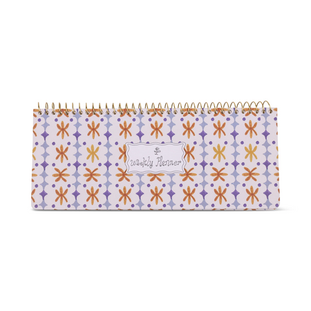 Patterned planner with spiral binding on a white background