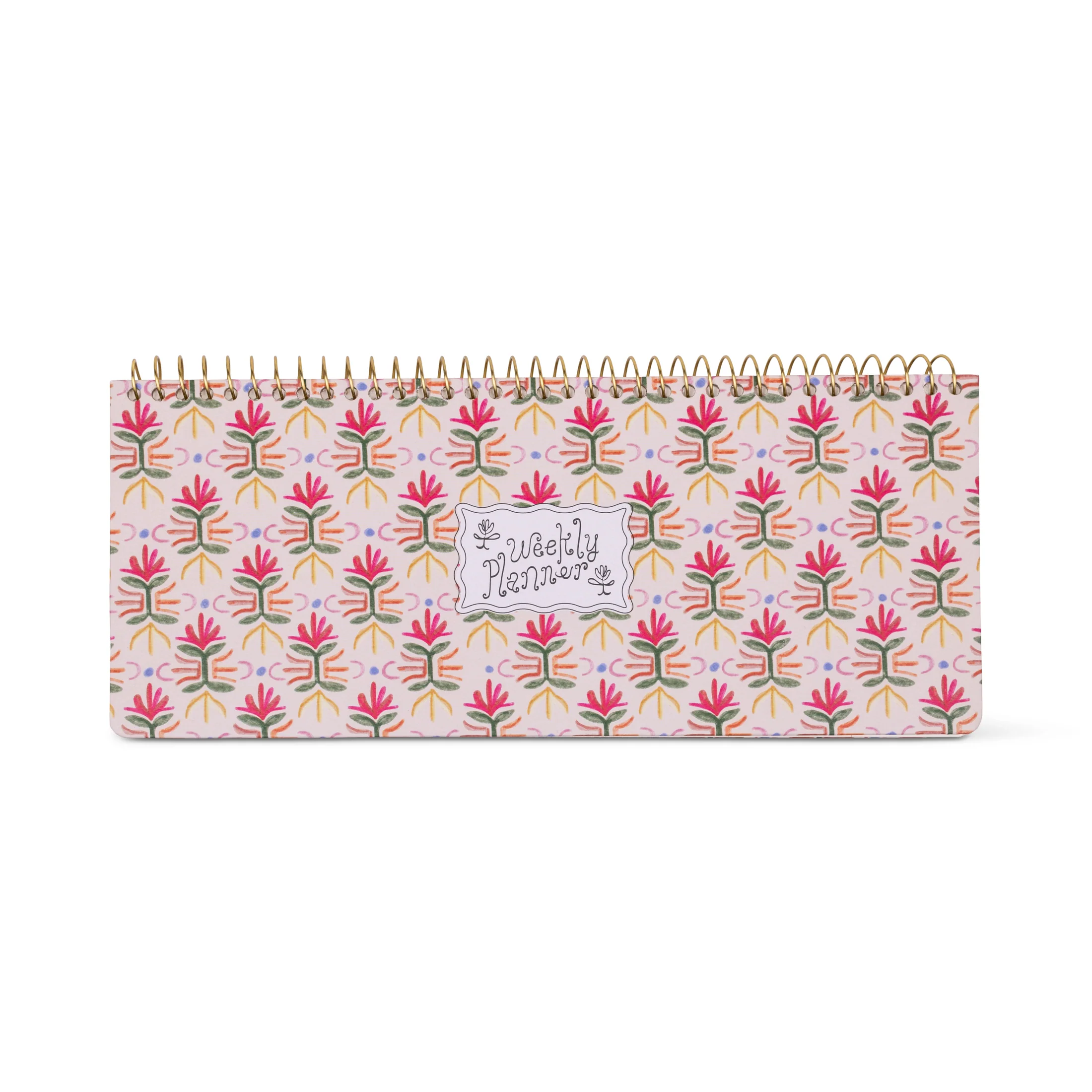 A weekly planner notebook with a colorful floral pattern on a light pink cover, bound with a gold spiral, shown against a plain white background.