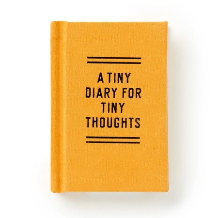 yellow tiny diary with text on the front that says "a tiny diary for tiny thought" on a white background