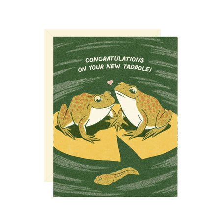 Greeting card with frogs and a tadpole on a green background