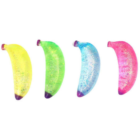 Four colorful banana-shaped objects with glittery textures on a white background