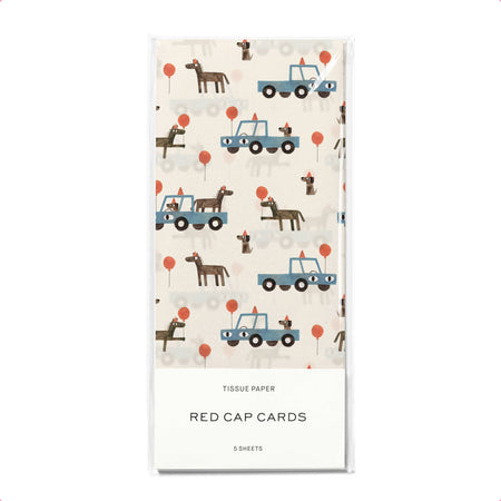 Tissue paper with truck and dog pattern on a white background, branded 'Red Cap Cards'.
