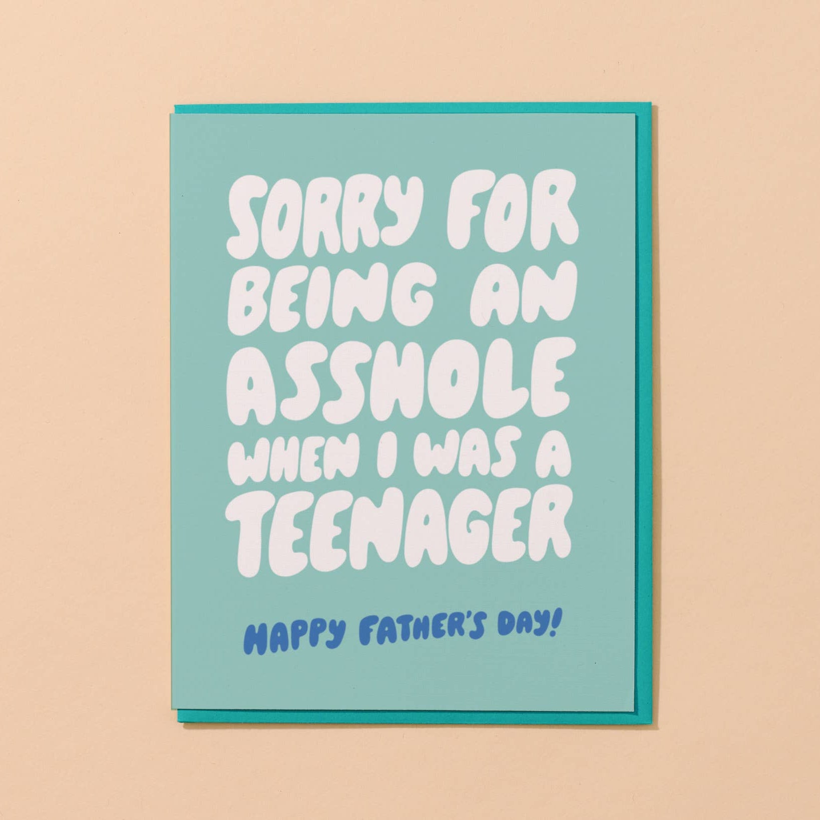 Father's Day card with humorous message on a beige background