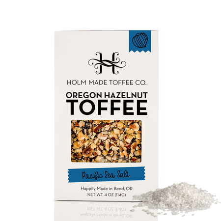 Box of Holm Made Toffee Co. Oregon Hazelnut Toffee with Pacific Sea Salt on a white background