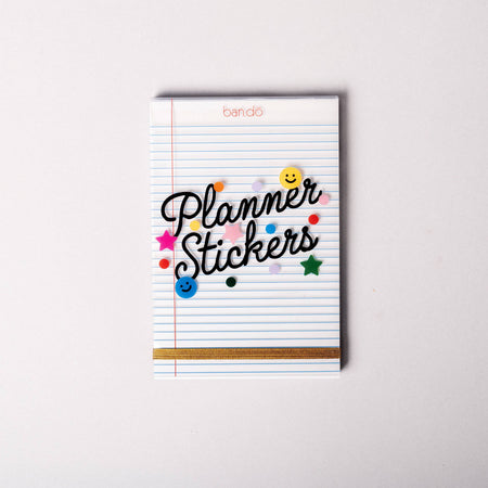 Notebook with 'Planner Stickers' text on a white background