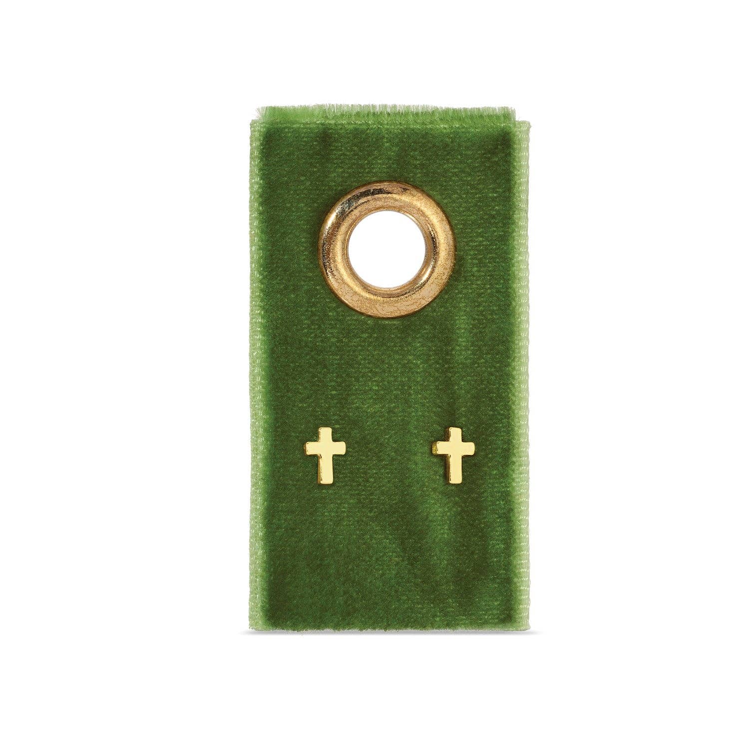 cross earrings on a green velvet card