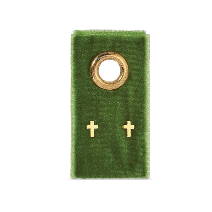 cross earrings on a green velvet card