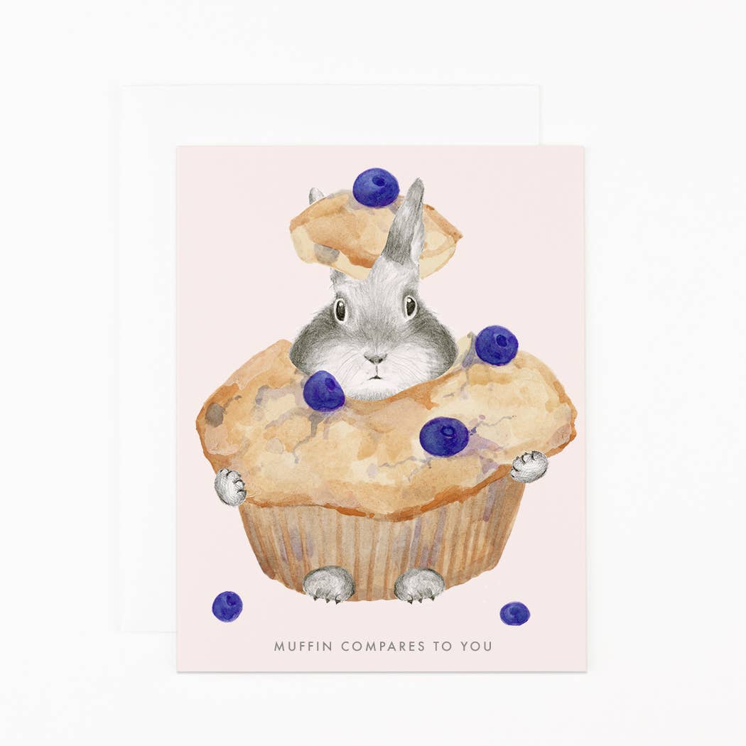 Illustration of a rabbit in a muffin with blueberries on a pink background