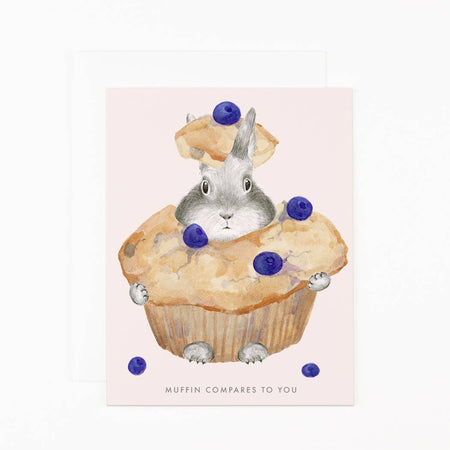 Illustration of a rabbit in a muffin with blueberries on a pink background