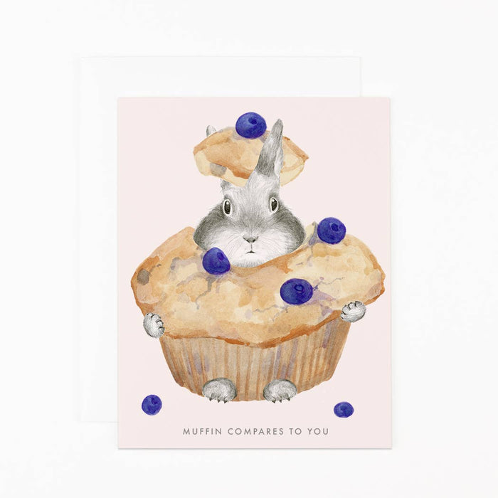Illustration of a rabbit in a muffin with blueberries on a pink background