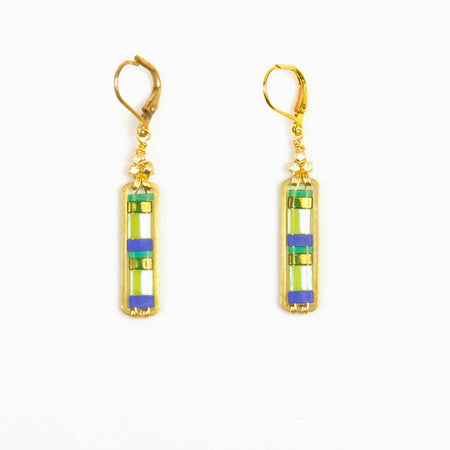 Gold earrings with rectangular green and blue stones on a white background