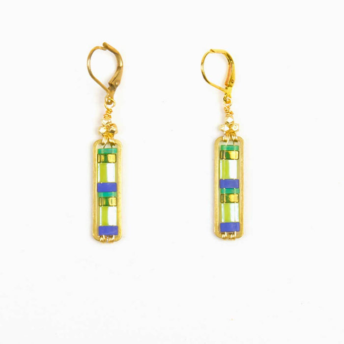 Gold earrings with rectangular green and blue stones on a white background
