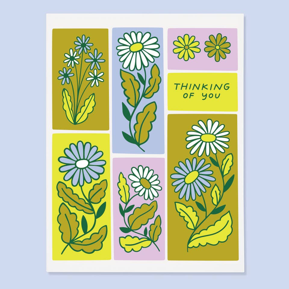 Card with floral design and 'Thinking of you' text on a light blue background