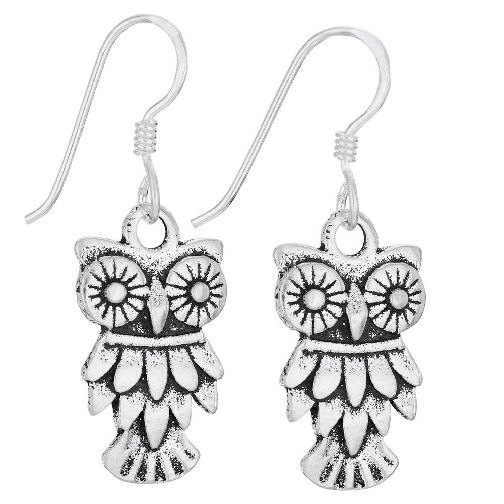 Silver owl-shaped earrings on a white background