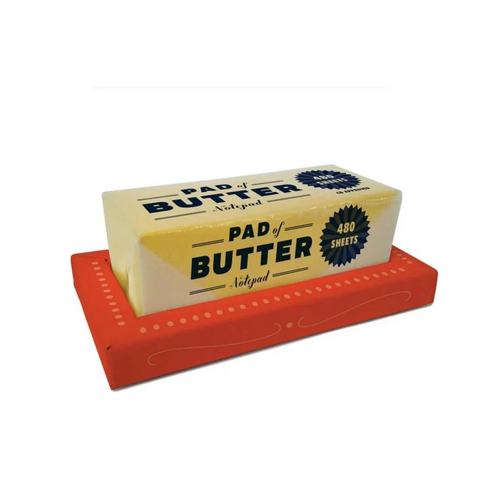 yellow notepad that looks like a stick of butter on a red dish, against a white background