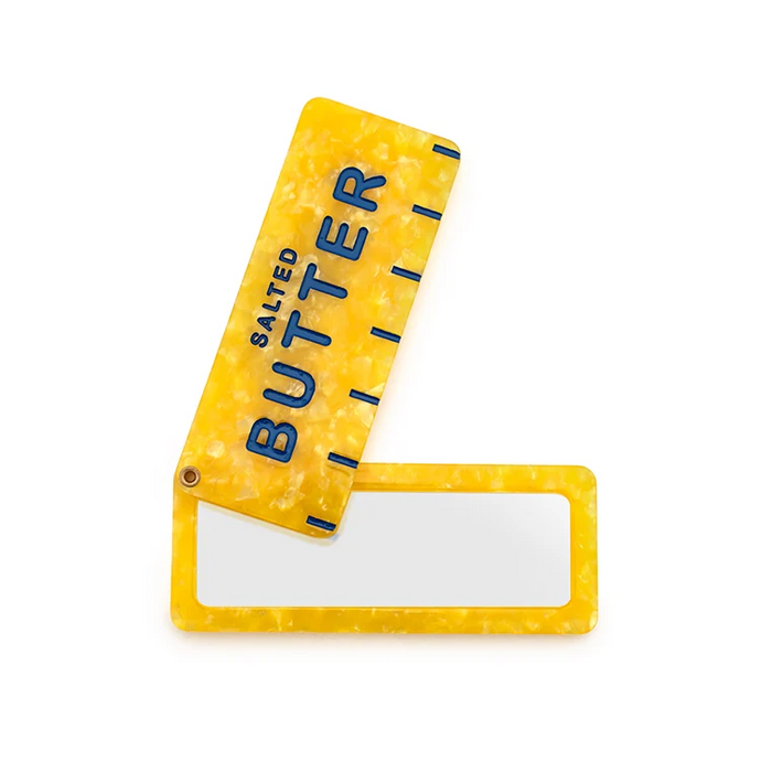 Butter compact mirror with 'Salted Butter' text on a white background