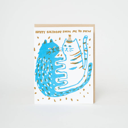 Birthday card with blue cats and gold text on a white background