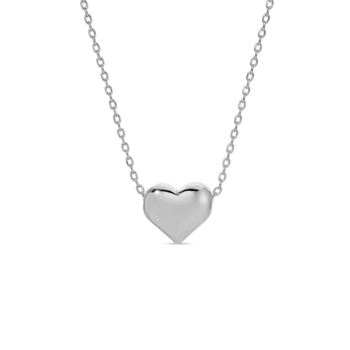 Silver heart-shaped pendant on a chain against a white background