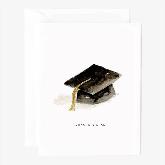 watercolor card with graduation cap illustration on a white card that reads "congrats grad"
