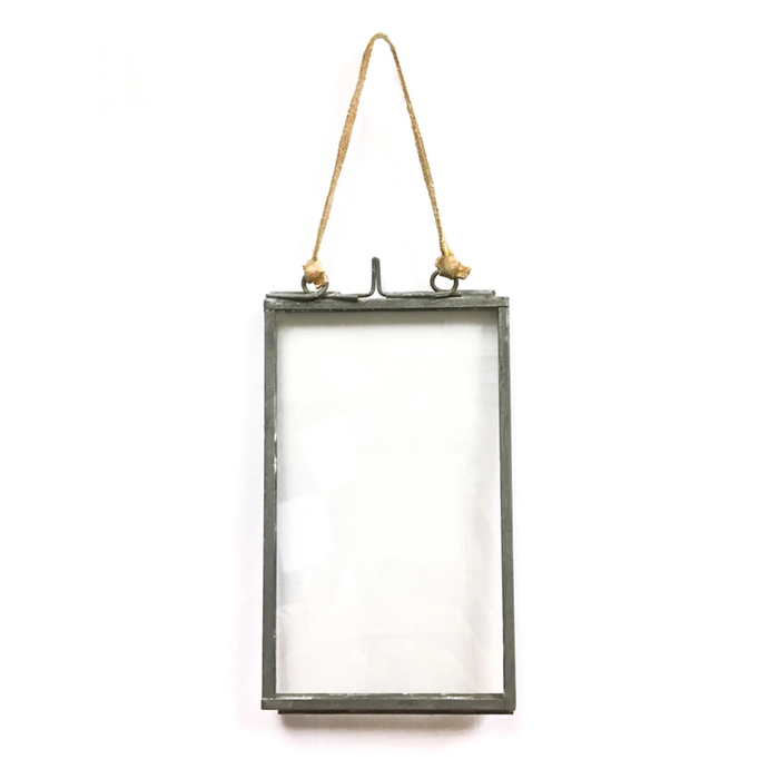 Small rectangular frame with a rustic metal finish and rope hanging on a white background