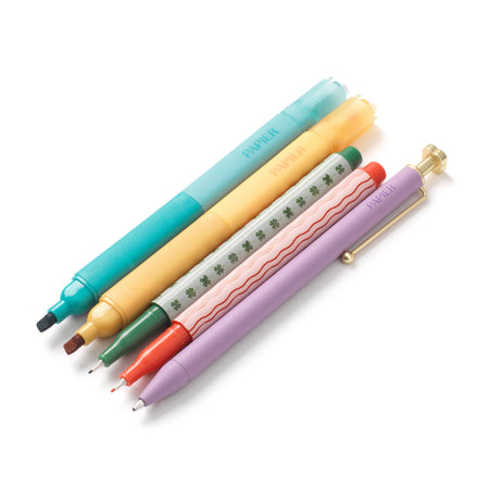 Set of colorful pens on a white background