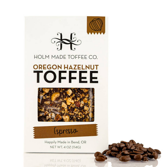 Holm Made Toffee Co. Oregon Hazelnut Toffee package with coffee beans on a white background