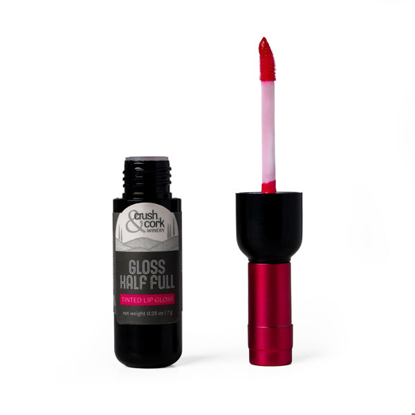 Lip gloss shaped like a wine bottle on a white background