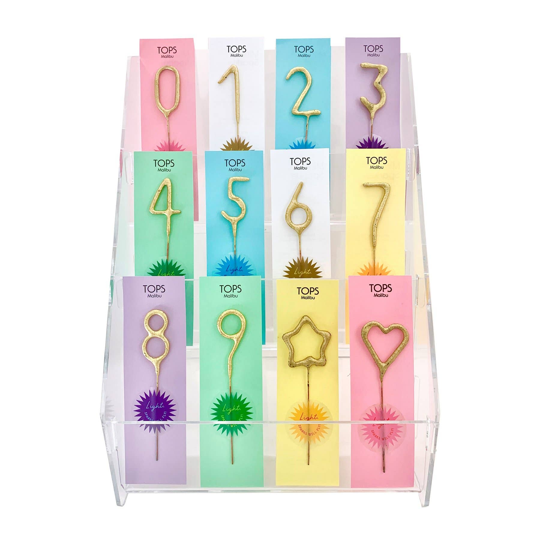 Set of colorful number sparkler candles and card holders on a stand