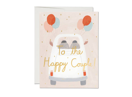 Greeting card with a car illustration and balloons, featuring the text 'To the Happy Couple!'.