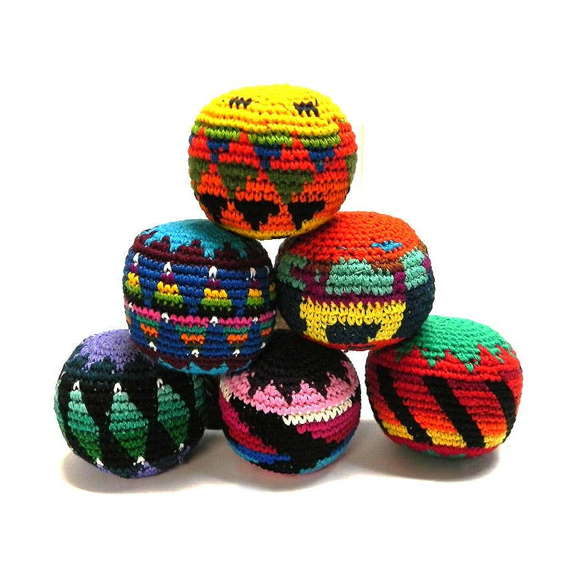 Colorful crocheted balls on a white background