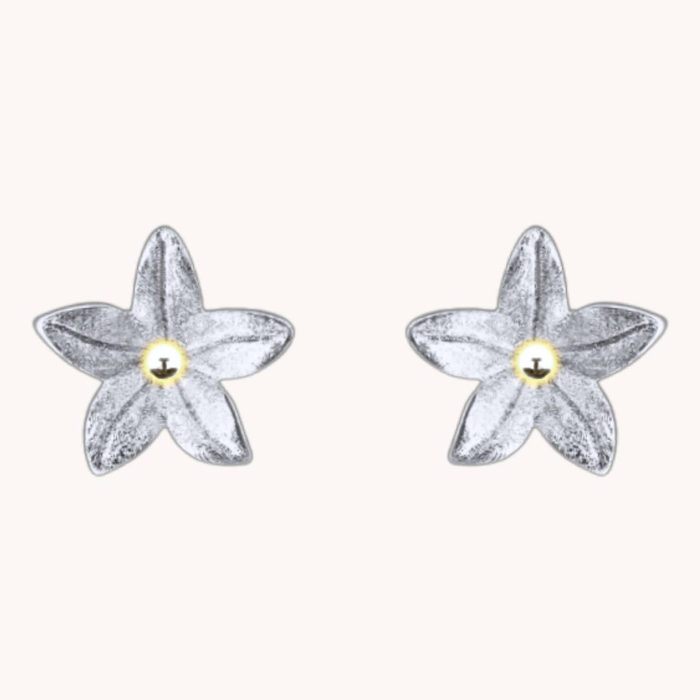 Pair of Summer Lily Silver Studs with five silver-tone petals and small gold-tone centers.