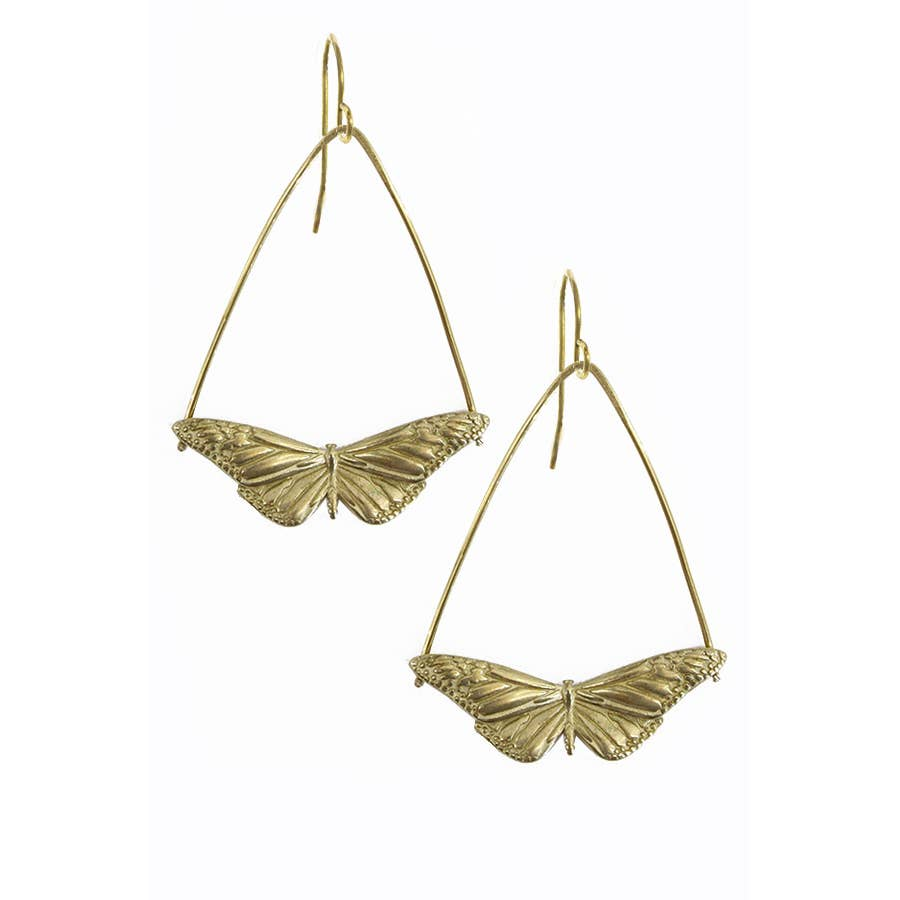 Gold butterfly-shaped earrings on a white background