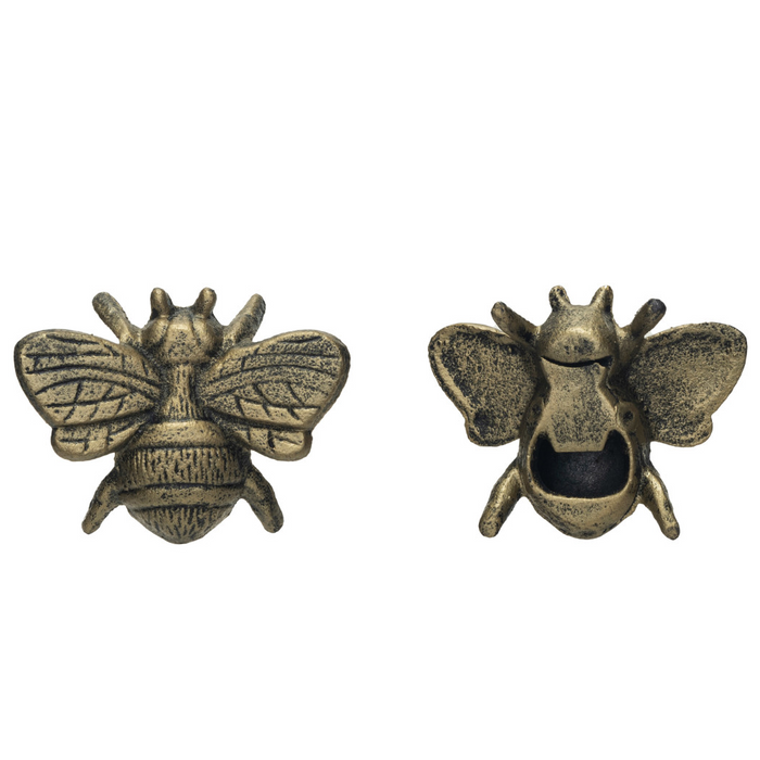 Pair of bronze bee-shaped earrings on a white background